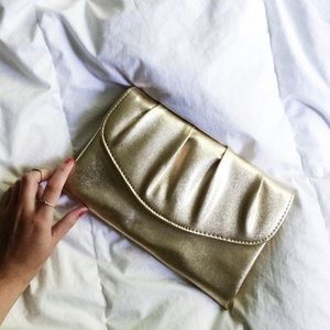 Metallic gold clutch